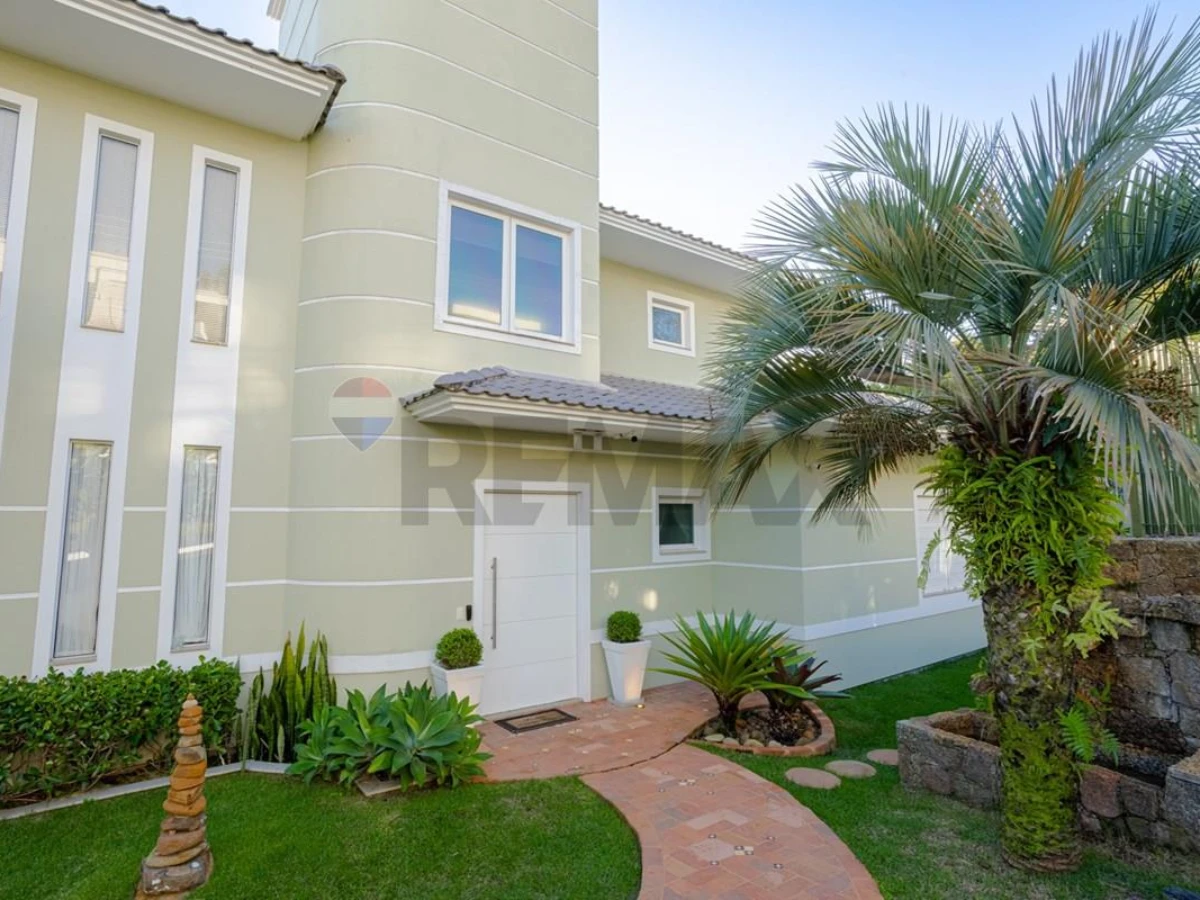 Casa Frente Mar em Cacupé, Florianópolis — 5 Suítes, 505 m²